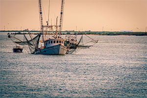 Fishing boat off Grand Isle, Louisiana, photo by thepipe26/Flickr